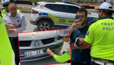 Plakasını bantla kapatan baba ve oğlu polis ablukaya aldı! Şoke eden savunma
