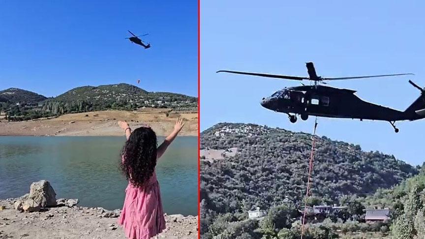 Skorsky tipi askeri helikopteri görünce elini kaldırdı! Küçük kıza unutulmaz anı